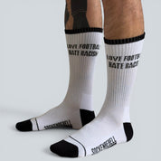 SOCKENREBELL white crew socks with black toe and heel, featuring "LOVE FOOTBALL HATE RACISM" text.