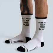 SOCKENREBELL white crew socks with black trim and text "ALLY PALLY IST NUR EINMAL IM JAHR".